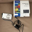 Olympus VG-160 Digital Compact Camera 5X Wide Zoom With Wall Charger Pictures. Fixed Price $92.95.