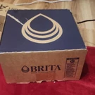Brita 10 Cup Filtering Pitcher, Plastic, Brown/blue, Removes Chlorine. Fixed Price $25.99.