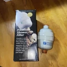 Premium Shower Filter By New Wave Enviro Gloss White Finish Sealed. Fixed Price $26.99.