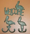 Pelican Coastal Theme Guest Bathroom Decor, Welcome / Towel Hooks, Metal. Fixed Price $23.70.
